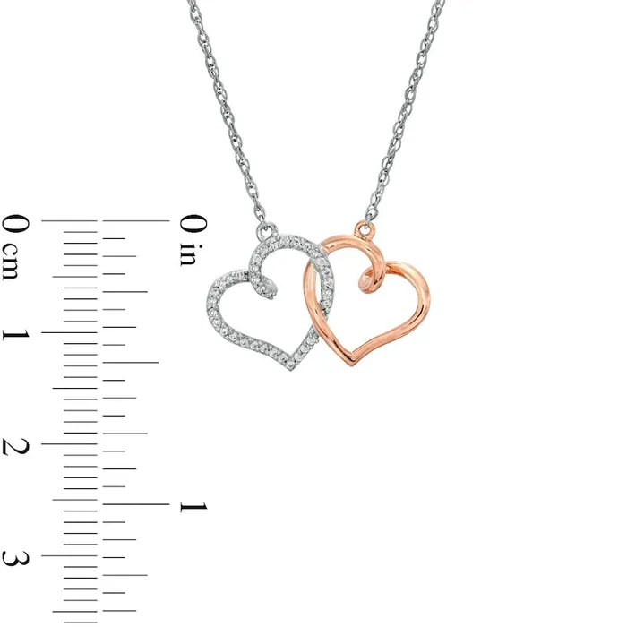 01 CT TW Natural Diamond Interlocking Heart Necklace in Sterling Silver and 10K Rose Gold Goldia Necklaces 01 CT TW Natural Diamond Interlocking Heart Necklace in Sterling Silver and 10K Rose Gold Goldia Necklaces