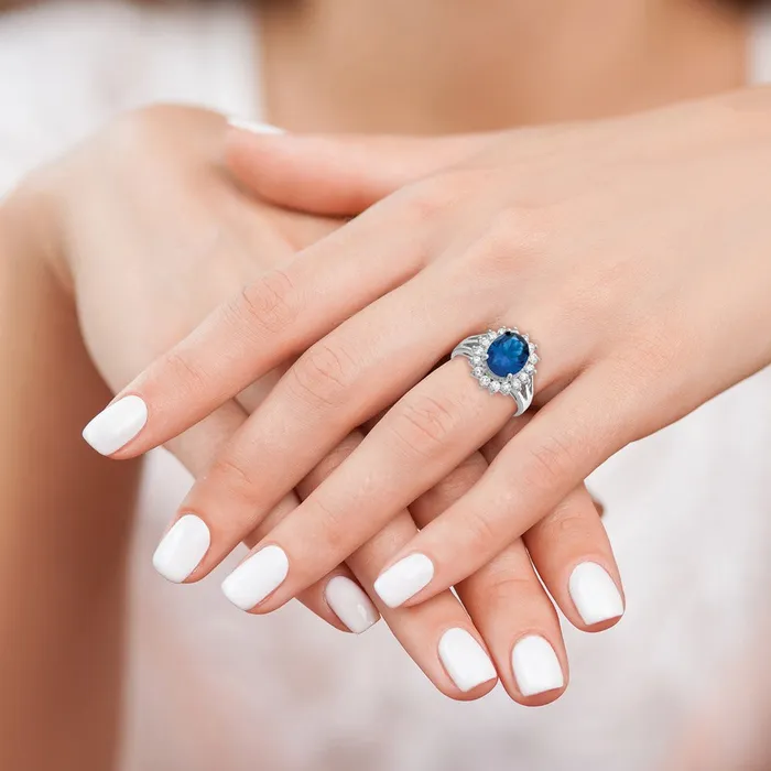 Goldia Rings Cheryl M Sterling Silver Rhodiumplated Brilliantcut Lab Created Dark Blue Spinel and Brilliantcut White CZ Oval Halo Ring