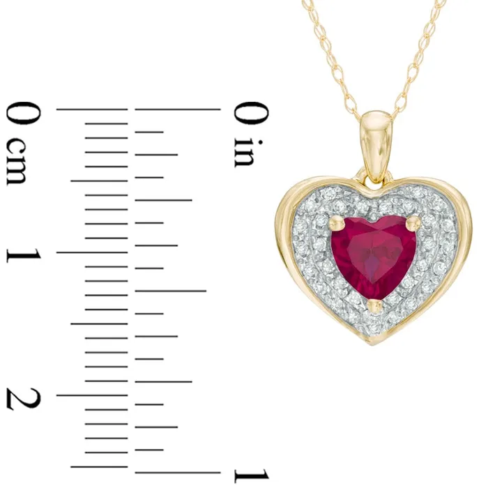 Necklaces Goldia 60mm HeartShaped LabCreated Ruby and 013 CT TW Diamond Frame Heart Pendant in 10K Yellow Gold Necklaces Goldia 60mm HeartShaped LabCreated Ruby and 013 CT TW Diamond Frame Heart Pendant in 10K Yellow Gold