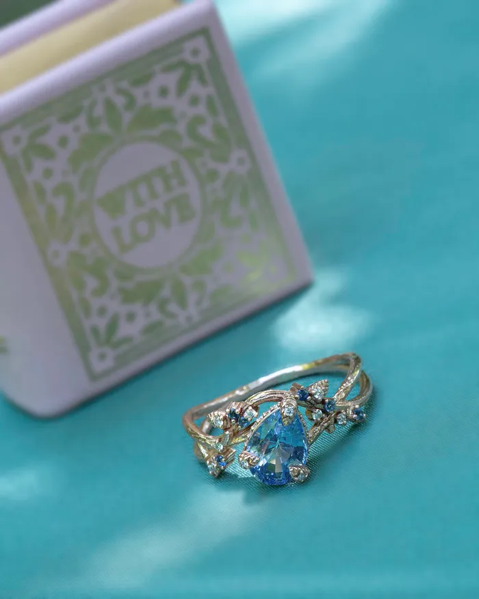 Rings Albrecht Jewellery Nature Inspired Pastel Blue Sapphire Leaf Engagement Ring 14K Gold